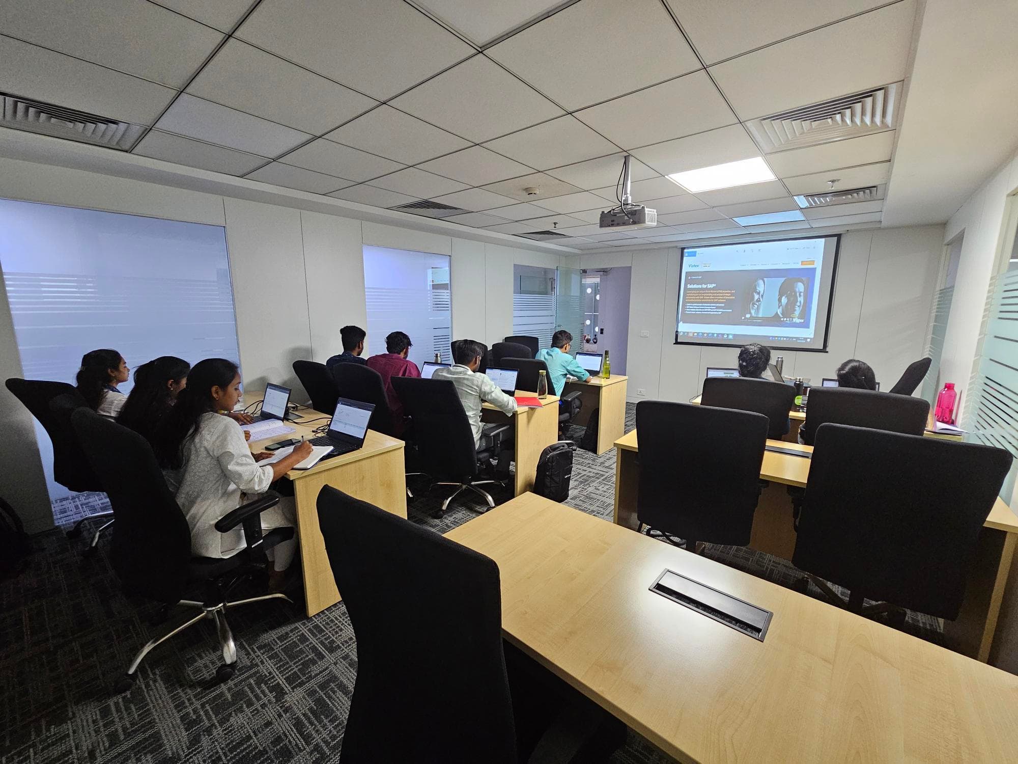 Vistex employees in the training room