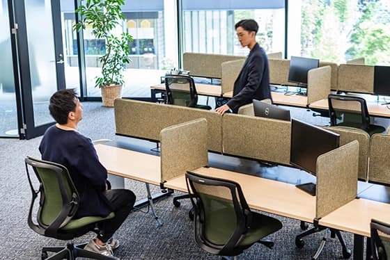 Two coworkers having conversation