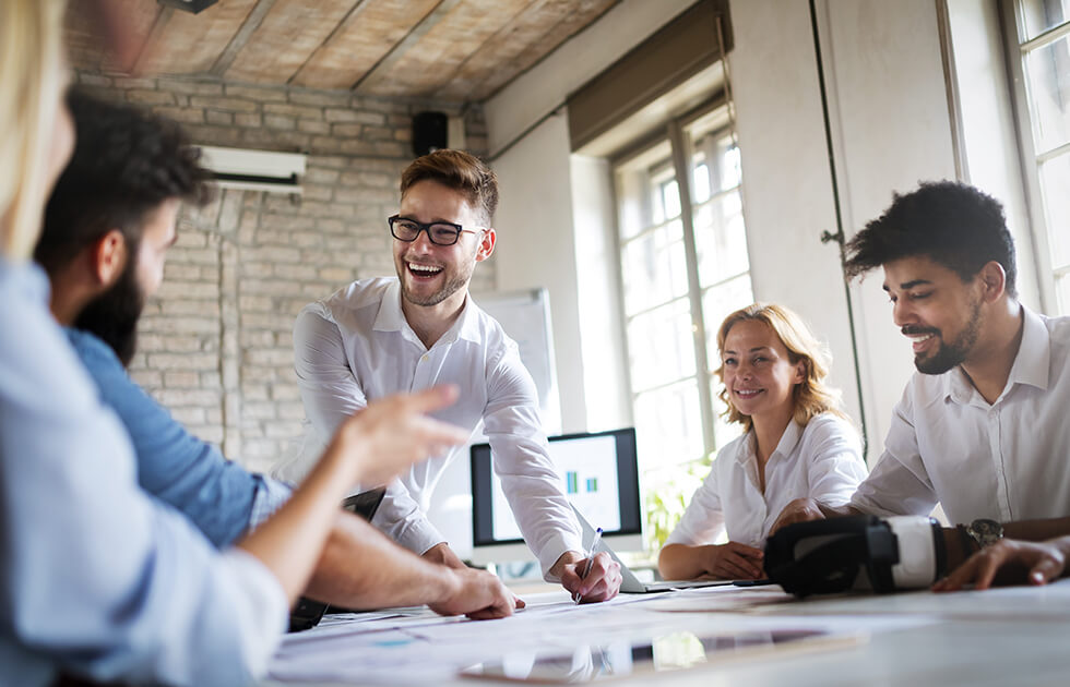 Happy workers in a business meeting